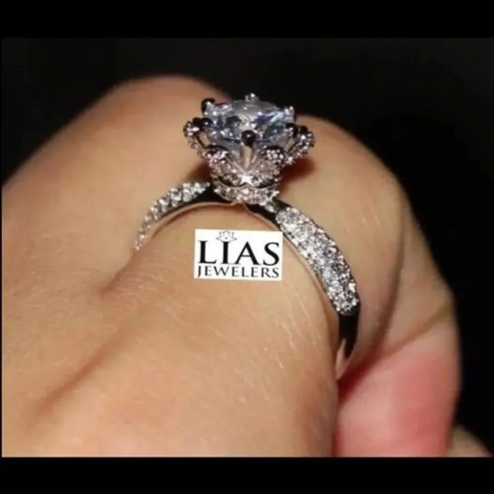 New 18k white gold engagement ring